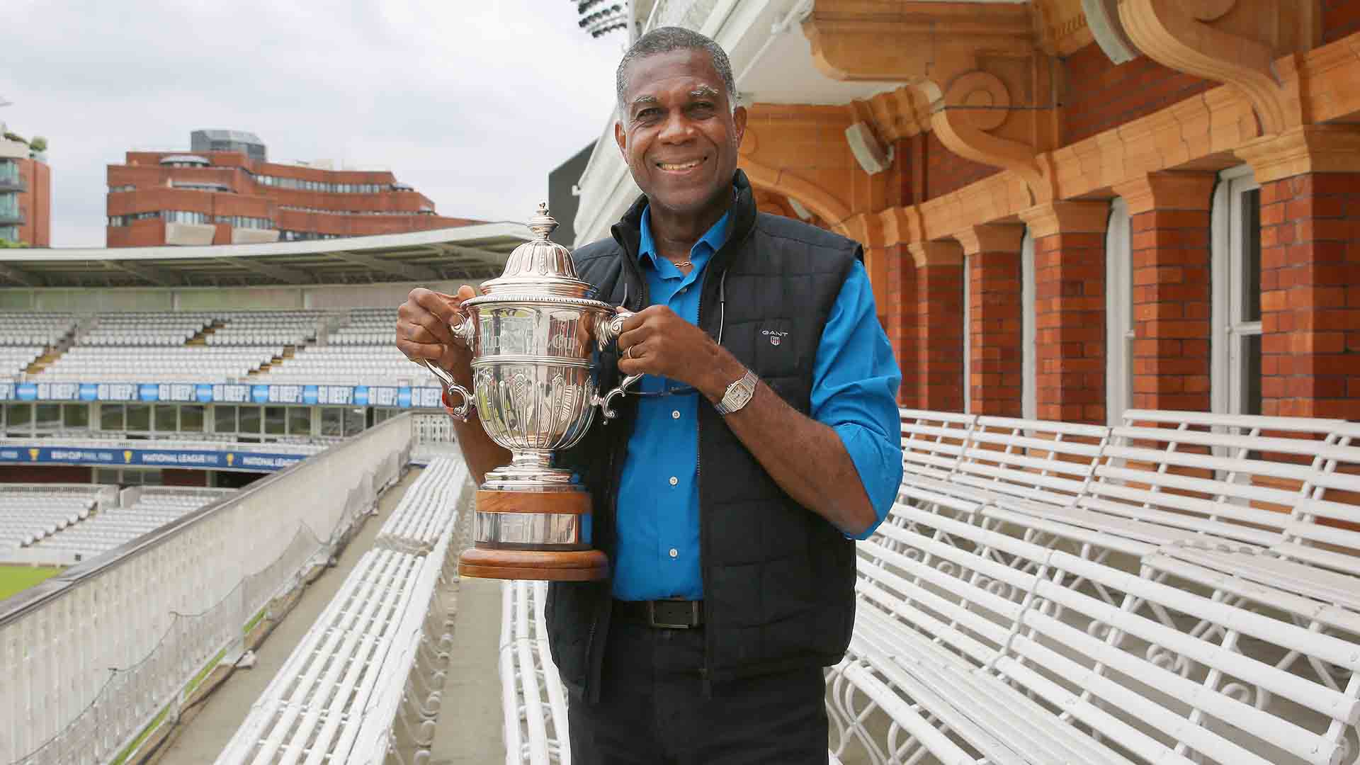 Michael Holding with the Prudential Cup 2019