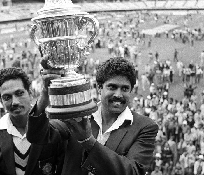 Kapil Dev with the 1983 Prudential Trophy